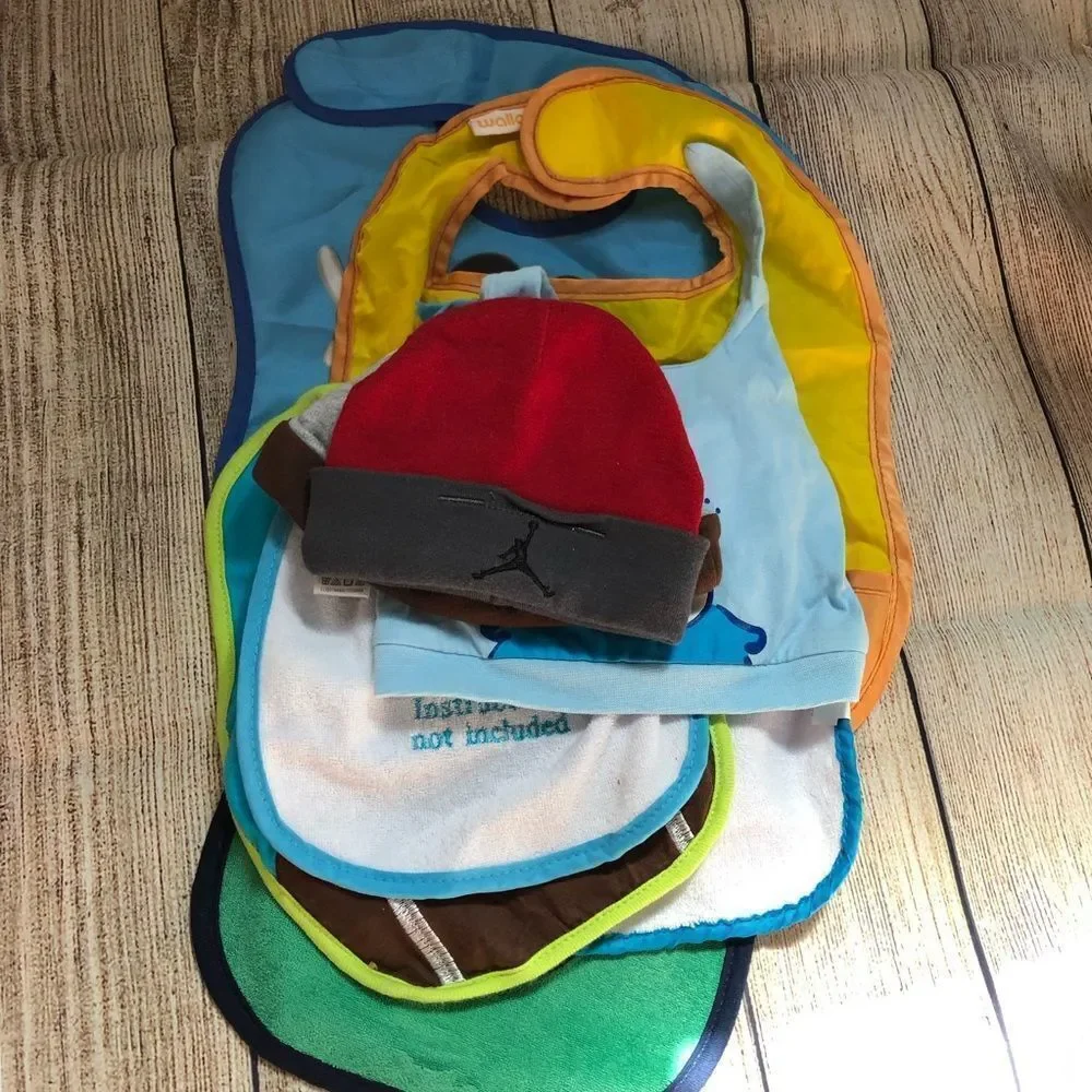 Baby Bundle of 8 includes: 2-Hats and 7 Bibs